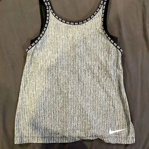 grey striped Nike athletic tank top